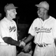 Jackie Robinson, Montreal Royals' first baseman, is shown shaking hands with Brooklyn Dodger manager Leo Durocher in March 1947 in Havana, Cuba, where the Dodgers and Royals played an exhibition game.